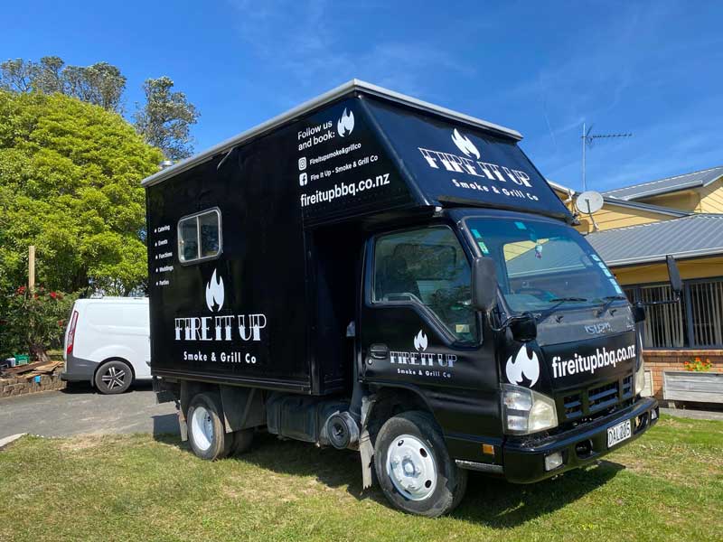 Fire It Up Smoke & Grill Co black BBQ food truck